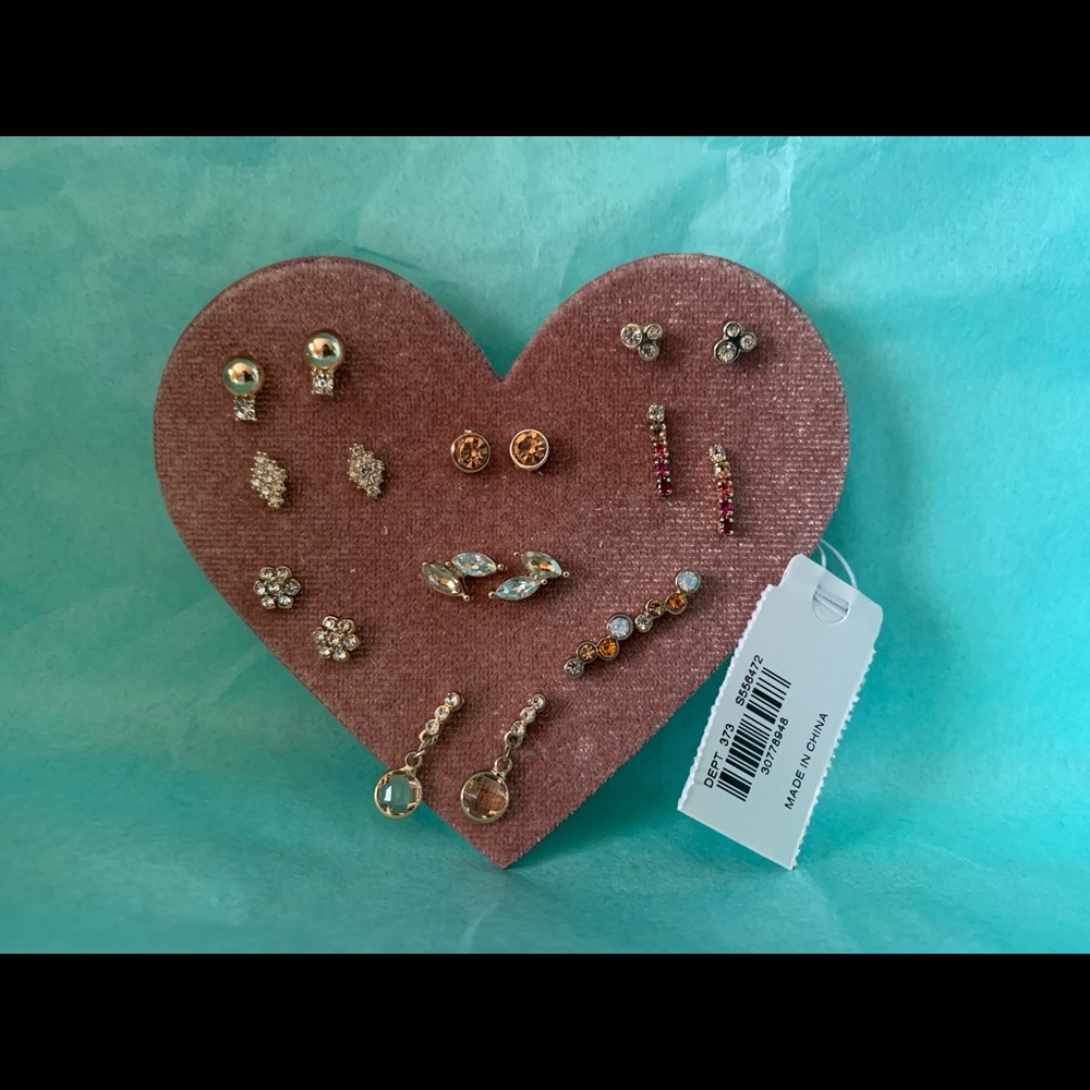 Set of nine arranged earrings